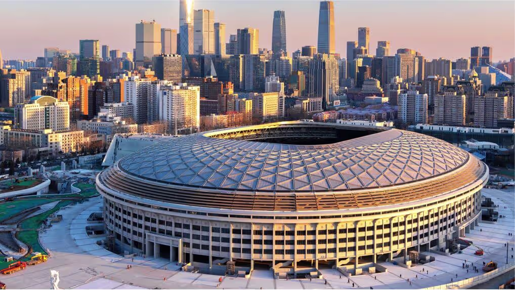 Beijing Workers' Stadium featuring LONGi Solar's building-integrated photovoltaics (BIPV) on its roof.