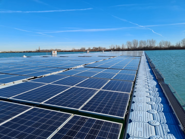 Floating solar PV installation on a lake in Italy featuring LONGi back contact modules.